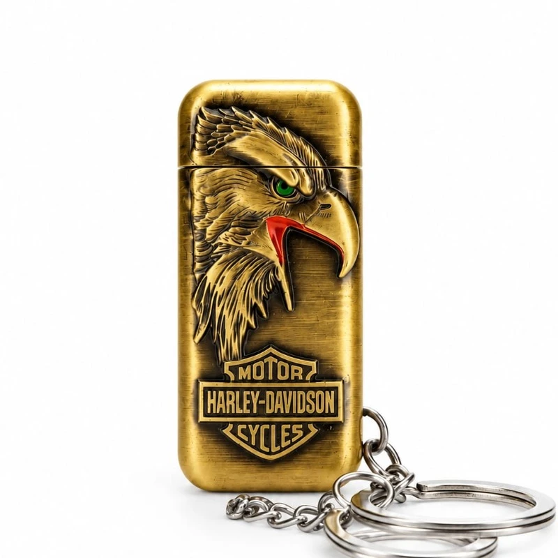 Antique brass Harley-Davidson eagle emblem metallic keychain lighter on white background
